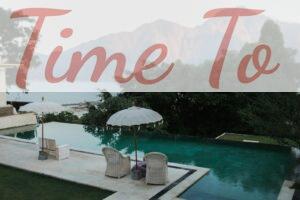 Relax by a serene infinity pool overlooking mountains and the ocean.