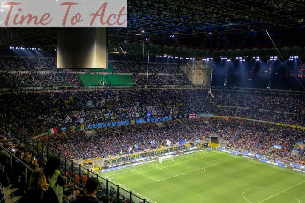 a stadium full of people watching a soccer game